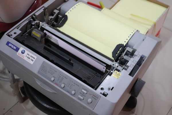 Old EPSON printer using perforated paper.