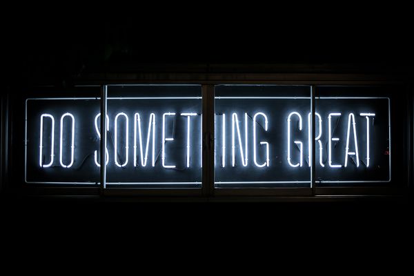 LED sign that reads: Do Something Great.